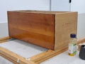 Applying finishing oil to wood