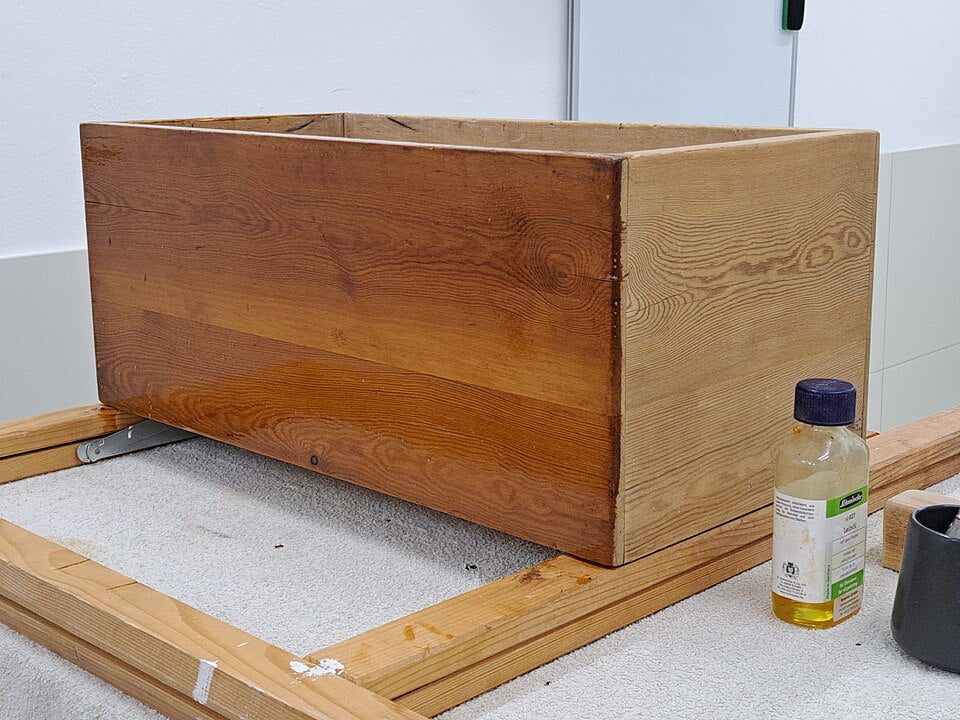 Applying finishing oil to wood